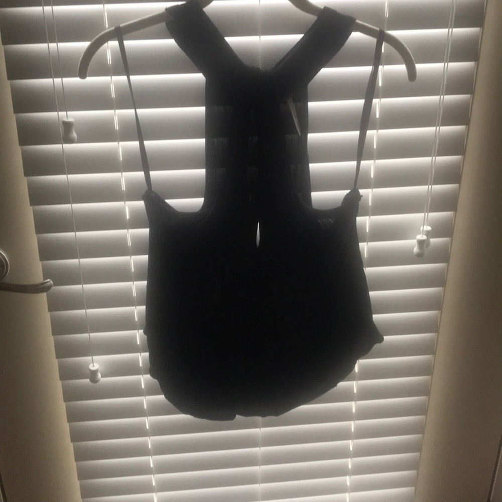 Black tank with key hole